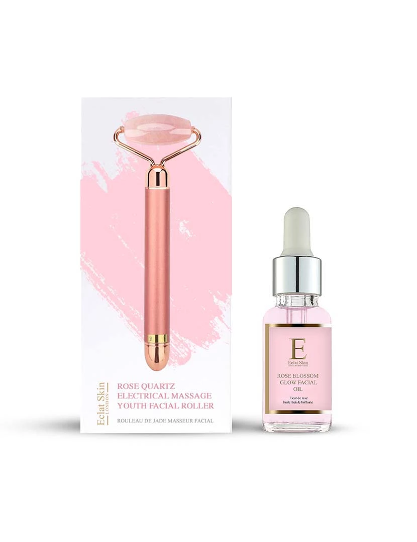 foto 1 de Massajador facial de quartzo rosa + óleo de flor de rosa 30ml